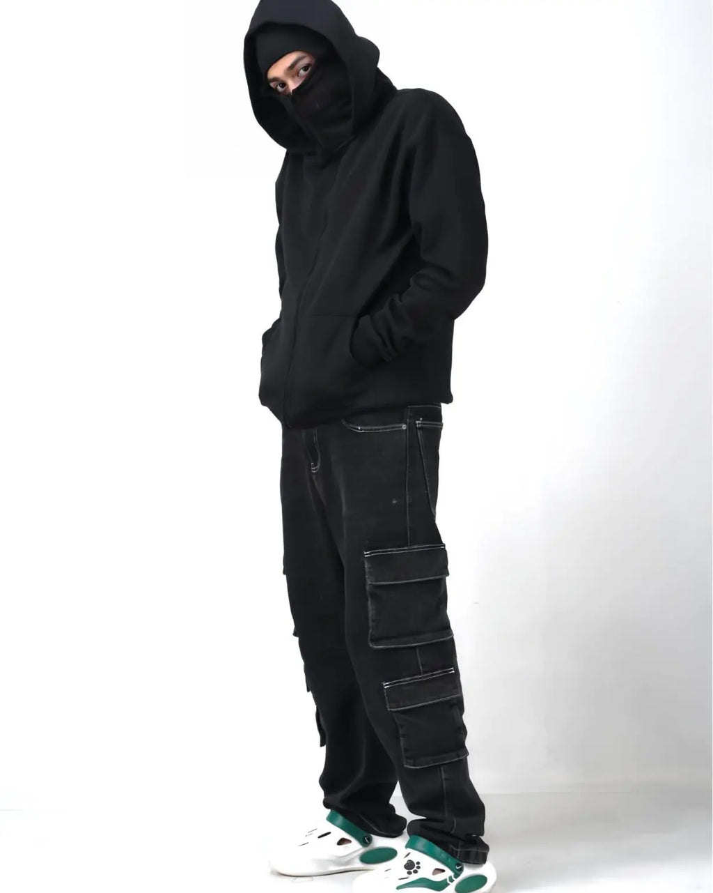Side profile of Suspended Clothing heavyweight distressed urban hoodie showing the structural boxy silhouette and dropped shoulders.